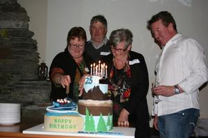 Founders Robyn Ross, Neil Ross, Lorraine Lindsay & Dart River Jet General Manager Clark Scott enjoying a 25th birthday cake.